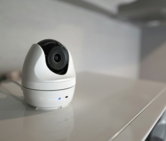 a-white-object-with-a-black-lens.jpg a white object with a black lens